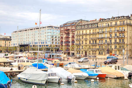 SWITZERLAND, GENEVA - May 06.2014: Boats and boat along the shore of the Genevan lakeのeditorial素材