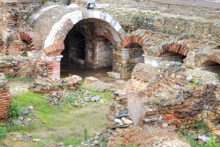 Ruins of the ancient buildings of the Roman Forum or the Ancient Agora in the historic center of cityの写真素材