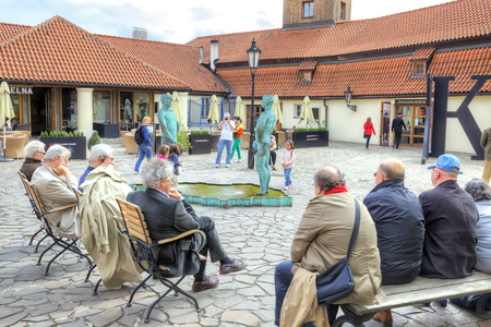CZECH REPUBLIC, PRAGUE - April 28.2014: Fountain Pee men architect David Black at the museum of Franz Kafka. Tourists consider fountainのeditorial素材