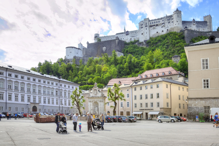 SALZBURG, AUSTRIA - May 05.2012: Old Square in the historical part of the city and the views of the mountain  Festung and Hohensalzburg Castleのeditorial素材