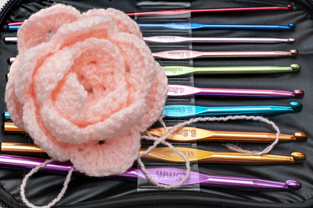 Multi-colored crochet hooks in different sizes in the package