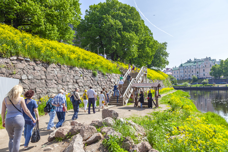 VIBORG, RUSSIA - June 05.2019: Group of tourists on the territory of the Vyborg fortressのeditorial素材