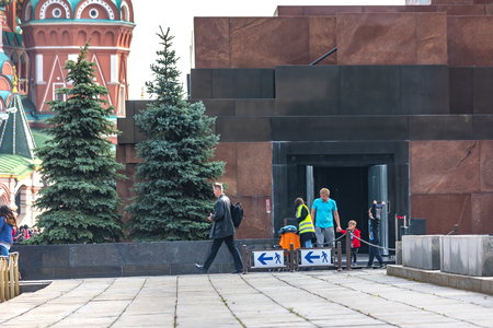 MOSCOW, RUSSIA - October 03.2019: People leave the Lenin Mausoleum and inspect the monuments located along the Kremlin Wallのeditorial素材