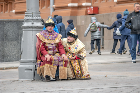 MOSCOW, RUSSIA - October 16.2019: Artists animators in clothes of Russian tsars waiting for a photo shoot with tourists on Manezhnaya Square near the Kremlinのeditorial素材