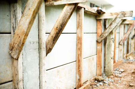 Reinforcement steel in the concrete posts for making the fence at the construction site