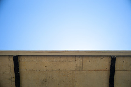 Abstract background perspective picture of reinforcement steel for concrete structure with clear blue sky in background.の写真素材