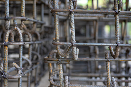 Closeup and selective focus of steelwork for reinforcement the concrete structure at the construction siteの写真素材