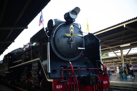 Bangkok,Thailand:December 5, 2018 - Closeup vintage steam train locomotive  parking at the station  waiting for departing.  Landscape of State Railway of Thailand, Hua Lum Pong stationのeditorial素材