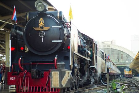 Bangkok,Thailand:December 5, 2018 - Closeup vintage steam train locomotive  parking at the station waiting for departing.  Landscape of State Railway of Thailand, Hua Lum Pong stationのeditorial素材