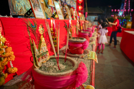 Selective focus on the fired incenses in the ashtray after praying.  Chinese new year celebration and traditional manner conceptの写真素材