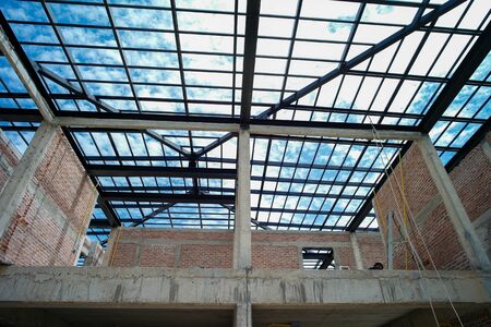 Perspective interior house under construction with clear blue sky backgroundの写真素材