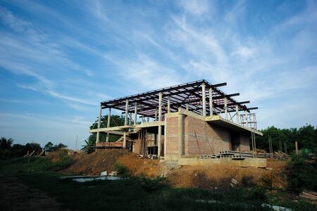 Perspective house under construction with clear blue sky backgroundの写真素材