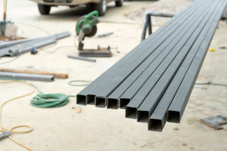 Closeup many steel bars with blurred background at the construction site.の写真素材