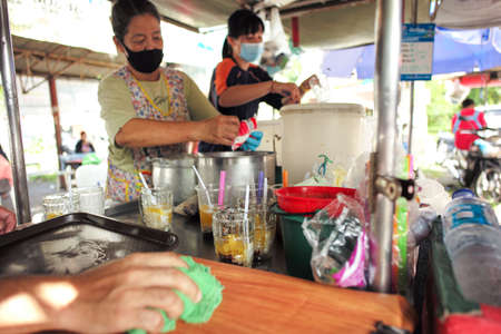 Songkhla, Thailand:July 29, 2020 - Local sweet of Hat Yai called Mun Diuey. Mixed sweeten fruit in the syrup. Famous street food at Songkhlaのeditorial素材