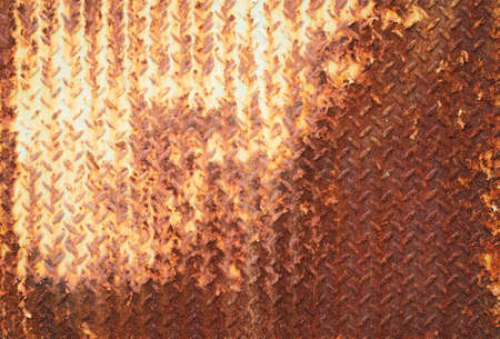 Weathered rusted surface of aged steel plate. Oxidized metal sheet.の写真素材