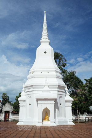 White big pagoda in the Buddhism temple with blue sky backgroundの写真素材