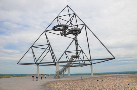 Bottrop, Germany - July 29th 2018: People walking on the mine dump around the Tetrahedron in Bottrop. The steel structure, an example of alternative Architecture, is a popular tourist attraction.のeditorial素材
