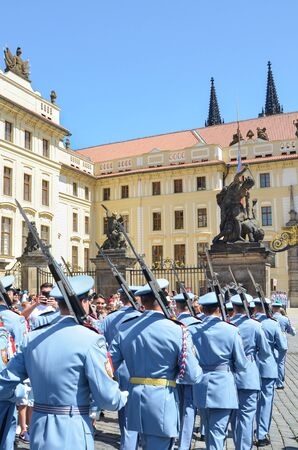 Prague, Czech Republic - June 27th 2019: Tourists watching traditional changing of honor guards in front of the Prague Castle. Prague Castle Guard. Crowd of people. Tourist attraction.のeditorial素材
