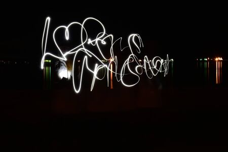 Playing with light, spread your heart during Valentine`s day. Heart painting; playing with light....