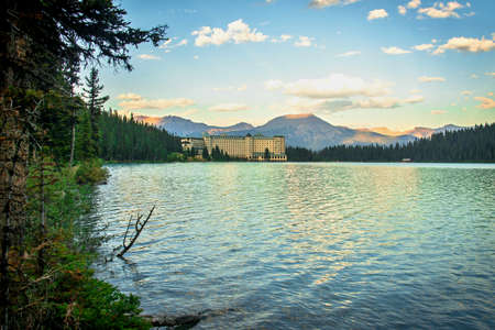 Lake Louise and Fairmont Chateau Hotel at sunset.のeditorial素材