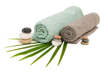 towel and stone, isolated on whiteの写真素材