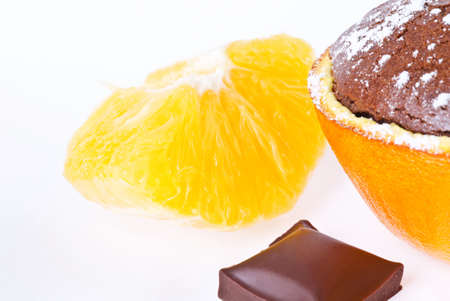 a souffle in orange with powder sugar and chocolateの写真素材