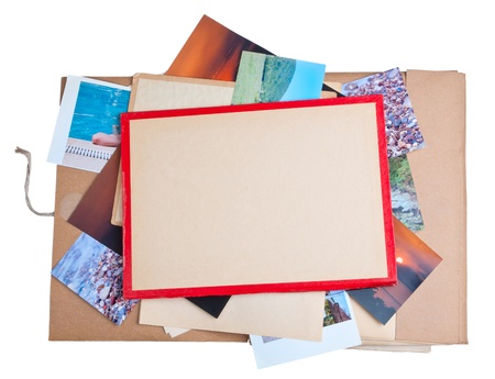 Old photos and book, isolated on whiteの写真素材