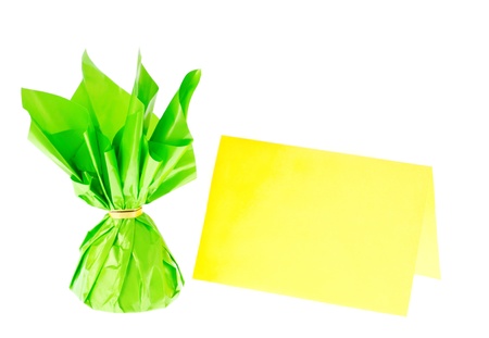 a green candy with wrapped message