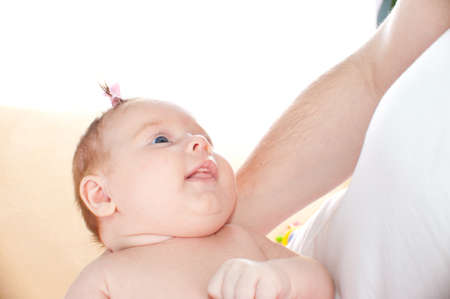 Newborn baby on mother hands,  isolated on white