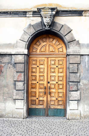 wall and old vintage wooden doorの写真素材