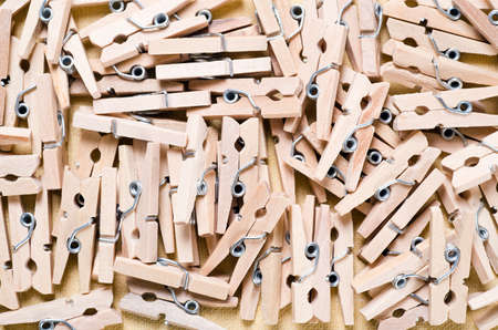 a wooden clothespin on white
