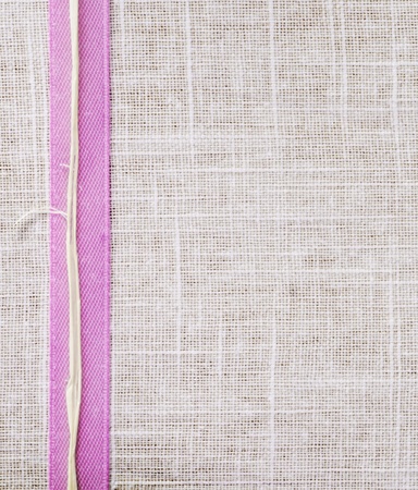 a texture of cloth with ribbonの写真素材
