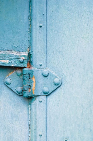 a green old metal door