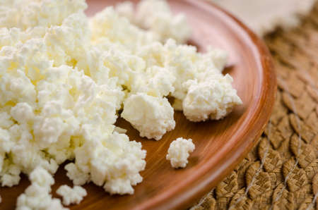 curds on the brown plate