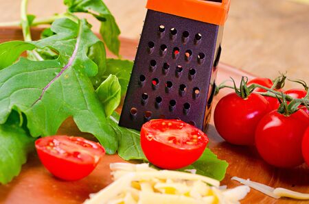 tomato cherry on wooden boardの写真素材