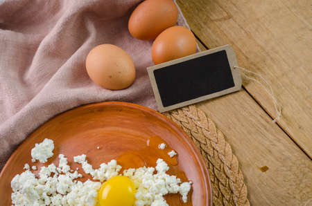 curds on the brown plateの写真素材