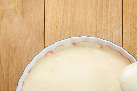 Preparation of delicious sweet cake flavored with ripe red strawberryの写真素材