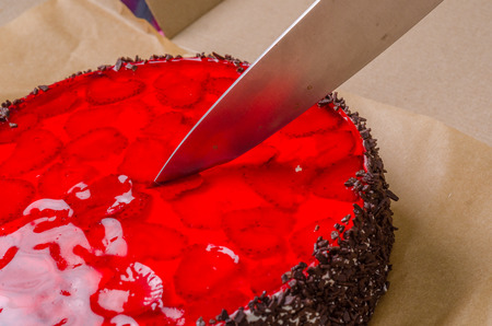 Preparation of delicious sweet cake flavored with ripe red strawberryの写真素材