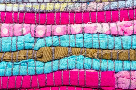 Bright multi-colored striped background thread and fabricの写真素材