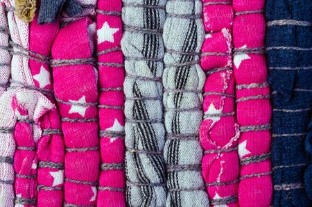 Bright multi-colored striped background thread and fabricの写真素材