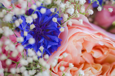 a bridal bouquet of flowers in pastel colorsの写真素材