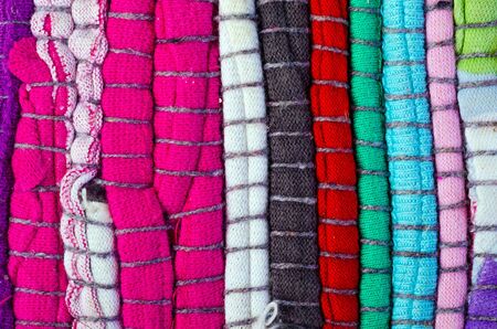 Bright multi-colored striped background thread and fabricの写真素材