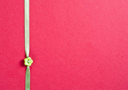 texture paper and ribbon with flower button and copy spaceの写真素材