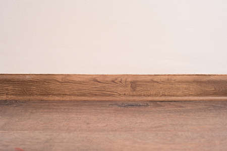 Empty white wall and wooden oak floorの写真素材