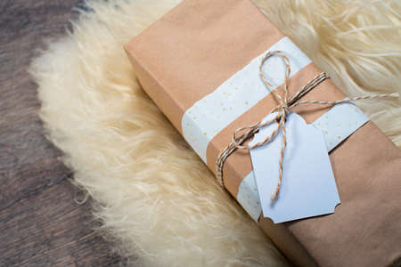 Gift box with blank gift white tagの写真素材