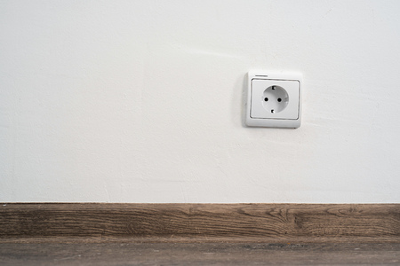 electrical outlet on white wall. home designの写真素材