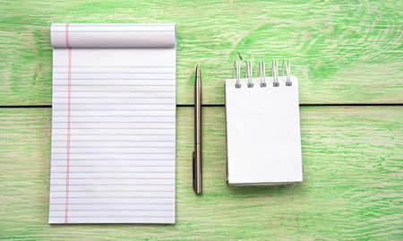 Spiral notebook. White blank notebook on grunge woodの写真素材