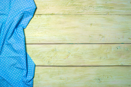 Tablecloth blue textile on wooden green backgroundの写真素材