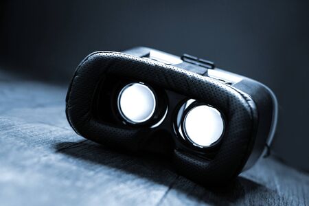 Virtual reality glasses concept. VR with futuristic three-dimensional image leaving the viewerの写真素材