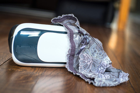 Virtual reality glasses for mobile devices with women lingerie and bra. VR concept, used for porn video in adult entertainmentの写真素材